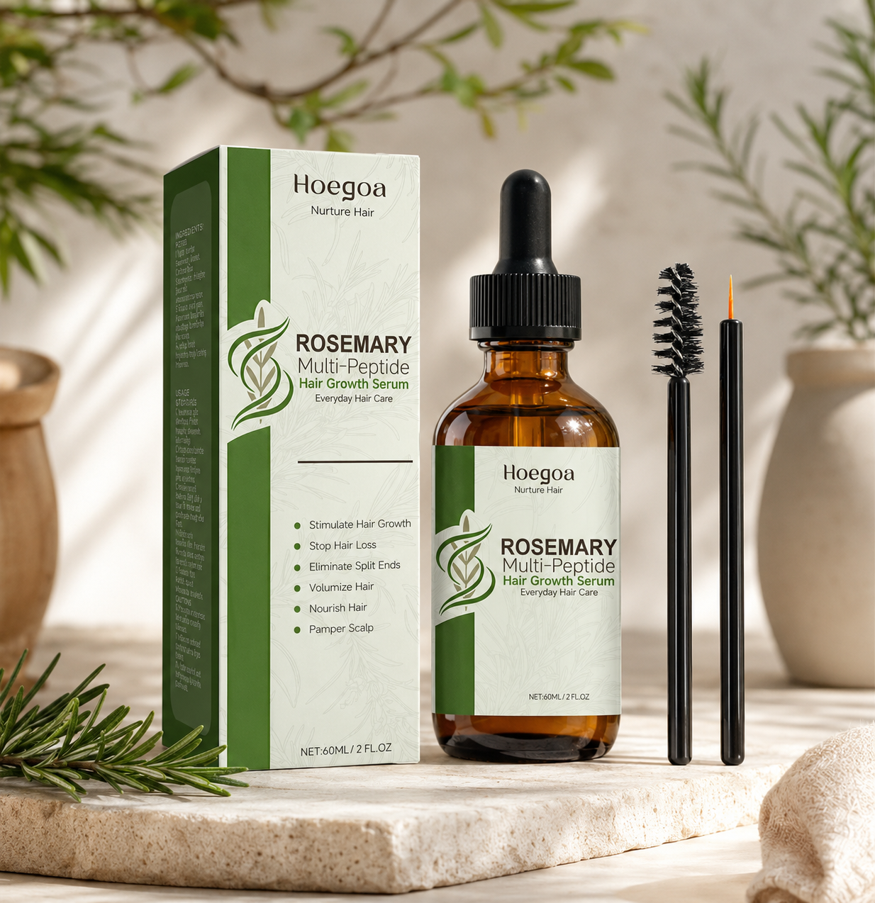 Hoegoa Rosemary Multi-Peptide Hair Growth Serum shown with its green and white box, an amber glass dropper bottle, and two black applicator tools on a stone surface with soft botanical props in the background.